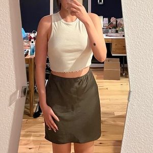Mid length green skirt